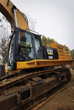 Caterpillar 390F L crawler excavator, side view Caterpillar 390F L crawler excavator, side view