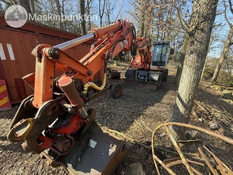 2003 Atlas 1404 wheel excavator, front three-quarter view 2003 Atlas 1404 wheel excavator, front three-quarter view