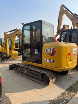 2025 Caterpillar 306E2 mini excavator, rear three-quarter view 2025 Caterpillar 306E2 mini excavator, rear three-quarter view