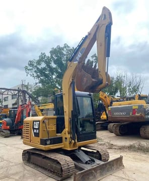 Caterpillar 305.5E mini excavator, rear three-quarter view Caterpillar 305.5E mini excavator, rear three-quarter view