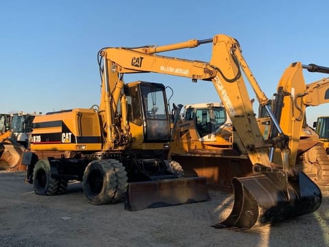 2000 Caterpillar M315 wheel excavator, side profile view 2000 Caterpillar M315 wheel excavator, side profile view