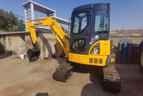 2018 Komatsu PC55MR-2 mini excavator, front three-quarter view 2018 Komatsu PC55MR-2 mini excavator, front three-quarter view