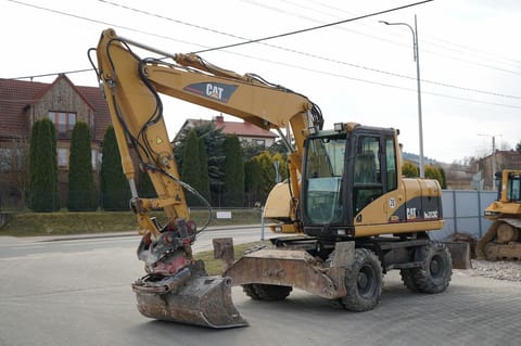 Pelle sur roues Caterpillar M313C de 2003 Pelle sur roues Caterpillar M313C de 2003