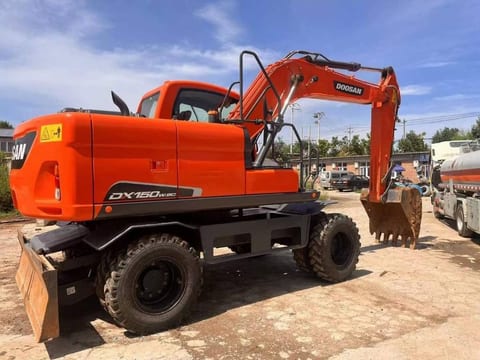 2024 Doosan DX150W-9C wheel excavator, rear three-quarter view 2024 Doosan DX150W-9C wheel excavator, rear three-quarter view