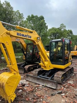 2022 Komatsu PC56-7 mini excavator, front three-quarter view 2022 Komatsu PC56-7 mini excavator, front three-quarter view