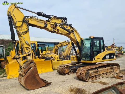 2008 Caterpillar 319DL crawler excavator, side view 2008 Caterpillar 319DL crawler excavator, side view