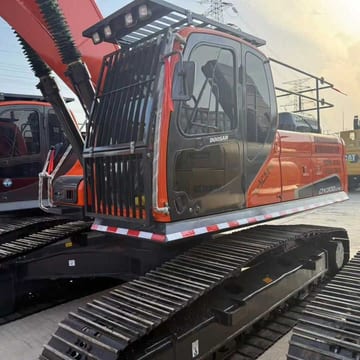 2023 Doosan DX300LC-9C crawler excavator, side view of cab and tracks 2023 Doosan DX300LC-9C crawler excavator, side view of cab and tracks