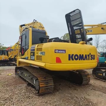 2022 Komatsu PC220 crawler excavator, rear three-quarter view 2022 Komatsu PC220 crawler excavator, rear three-quarter view