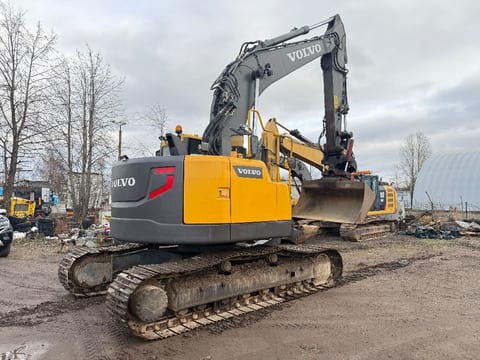 2013 Volvo ECR235 crawler excavator, rear three-quarter view 2013 Volvo ECR235 crawler excavator, rear three-quarter view