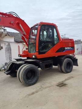 Doosan DH150W-7 wheel excavator, side view Doosan DH150W-7 wheel excavator, side view