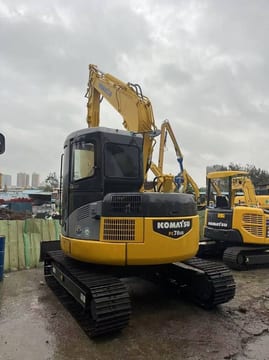 2023 Komatsu PC78US crawler excavator, rear three-quarter view 2023 Komatsu PC78US crawler excavator, rear three-quarter view