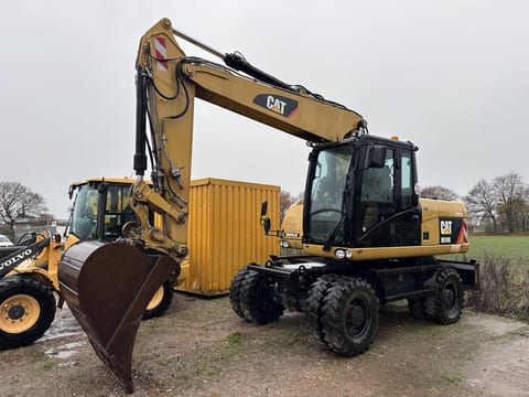 2013 Caterpillar M316D wheel excavator, front three-quarter view 2013 Caterpillar M316D wheel excavator, front three-quarter view