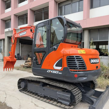 Doosan DX60-9C mini excavator, front three-quarter view Doosan DX60-9C mini excavator, front three-quarter view