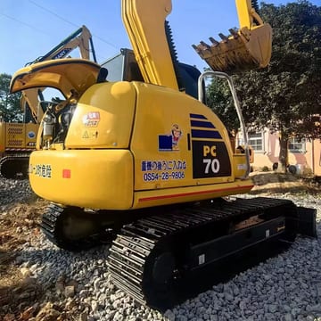 Komatsu PC70-8 crawler excavator, rear three-quarter view Komatsu PC70-8 crawler excavator, rear three-quarter view