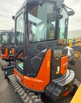 2025 Hitachi ZX38U-6 mini excavator, rear three-quarter view 2025 Hitachi ZX38U-6 mini excavator, rear three-quarter view