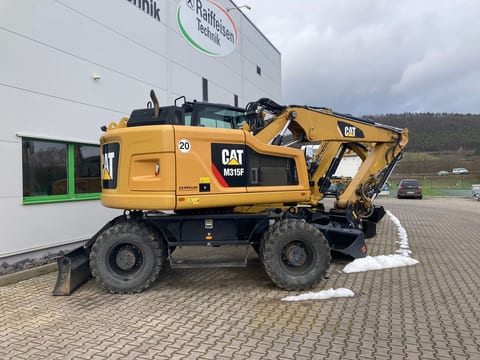 2022 Caterpillar M315F wheel excavator, side profile view 2022 Caterpillar M315F wheel excavator, side profile view