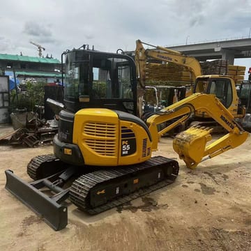 Komatsu PC-55MR mini excavator, front three-quarter view Komatsu PC-55MR mini excavator, front three-quarter view