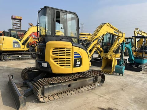 2024 Komatsu PC40 MR mini excavator, rear three-quarter view 2024 Komatsu PC40 MR mini excavator, rear three-quarter view