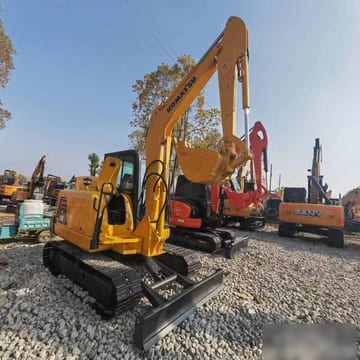 2024 Komatsu PC56 excavator, front three-quarter view 2024 Komatsu PC56 excavator, front three-quarter view