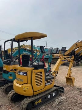 2020 Komatsu PC18MR mini excavator, rear three-quarter view 2020 Komatsu PC18MR mini excavator, rear three-quarter view