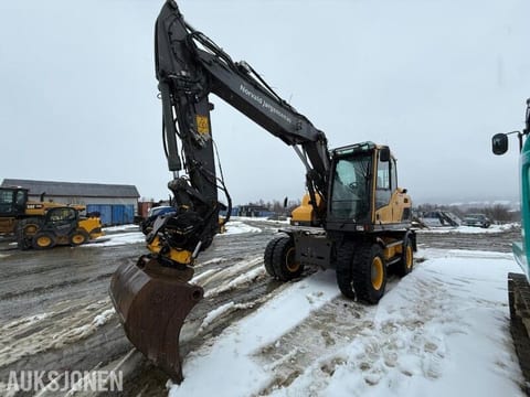 2014 Volvo EW140D wheel excavator, front three-quarter view 2014 Volvo EW140D wheel excavator, front three-quarter view