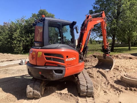 2020 Kubota KX057-4 mini excavator, rear three-quarter view 2020 Kubota KX057-4 mini excavator, rear three-quarter view