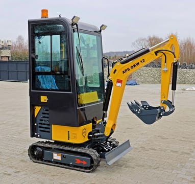 APS OKW12 mini excavator, side view APS OKW12 mini excavator, side view