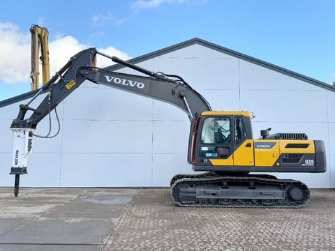 2025 Volvo EC220D crawler excavator side view with hammer attachment 2025 Volvo EC220D crawler excavator side view with hammer attachment