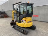 2023 Komatsu PC24MR-5 mini excavator, rear three-quarter view