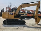 2022 Caterpillar 312D2 GC crawler excavator, side view