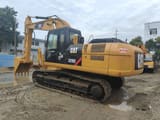Caterpillar 329D crawler excavator, rear three-quarter view
