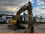 2005 Caterpillar 311C crawler excavator, side view