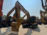 2022 Caterpillar 323D2L crawler excavator, front three-quarter view