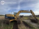 1995 Komatsu PC120-5 crawler excavator, rear three-quarter view