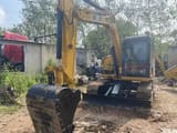 2024 Caterpillar 308E2 mini excavator, front three-quarter view