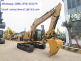 2023 Caterpillar 313D2 GC crawler excavator, side view