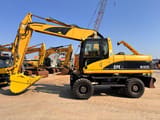 2006 Caterpillar M322C wheel excavator, side view