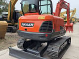 Doosan DX60-9C Mini Excavator, rear three-quarter view