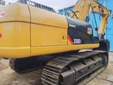 2018 Caterpillar 330D2 crawler excavator, rear three-quarter view