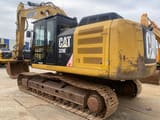 2012 Caterpillar 329E LN crawler excavator, rear three-quarter view