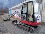 2012 Takeuchi TB 228 mini excavator, rear three-quarter view