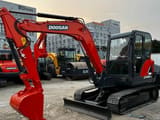 2023 Doosan DX60-9C mini excavator, side view