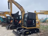 2023 Caterpillar 306E2 mini excavator, side view