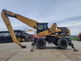 2009 Caterpillar M325D LMH material handler, side profile view