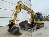 2022 Komatsu PC138US-11 crawler excavator, front three-quarter view
