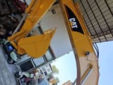 Escavadora de rastos Caterpillar 320CL de 2010, vista da lança e do balde