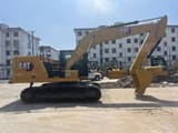 2024 Caterpillar 320GC crawler excavator, side view