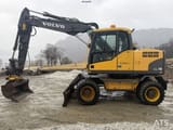 2007 Volvo EW140C wheel excavator, side view