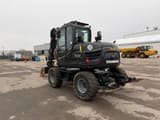 2023 Yanmar B95W wheeled excavator, rear three-quarter view