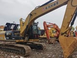 2020 Caterpillar 323DL crawler excavator, side profile view